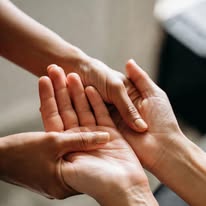 Calm, attentive hand massage
